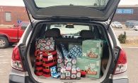 Donated car loaded with gifts