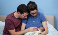 Craig and Becky Markovitz hold their son, Aaron, who died at seven weeks old of chronic lung disease.