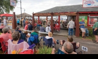  Folks enjoying the warm weather and great music at Tally’s Dockside. 