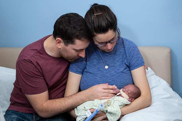 Craig and Becky Markovitz hold their son, Aaron, who died at seven weeks old of chronic lung disease.