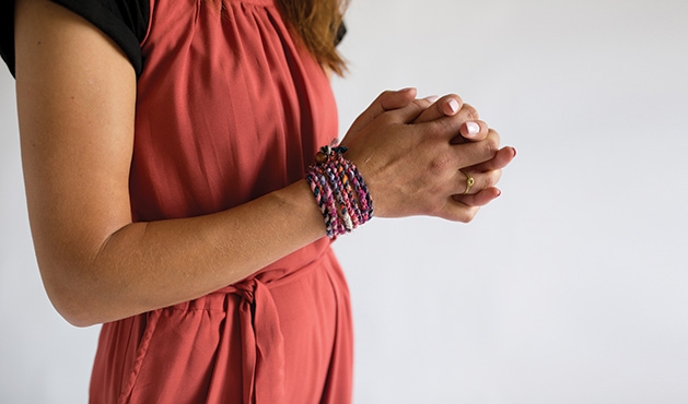 A woman models clothing from fashion nonprofit 3seams.