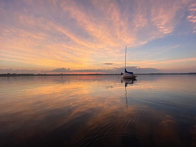 Swirling, sun-kissed clouds make for a serene, award-winning photo.  