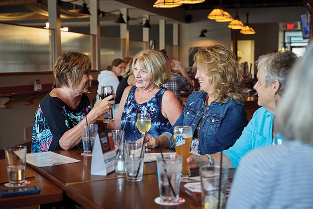 White Bear Lake Social Meetup Members of the White Bear Lake Social Meetup enjoy drinks at happy hour.