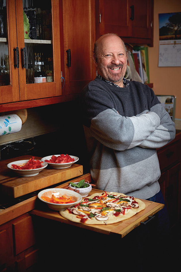 Chef Lee Wolfson with a pizza.