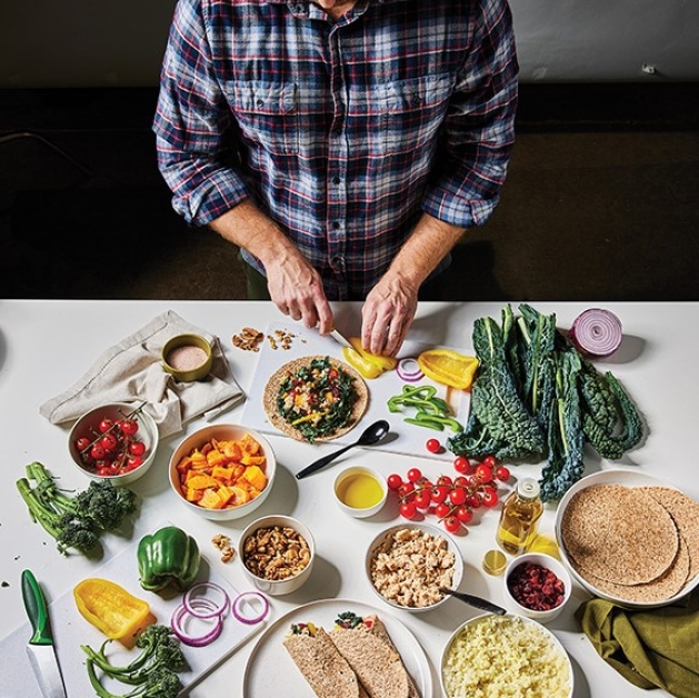 Man preparing vegetables.