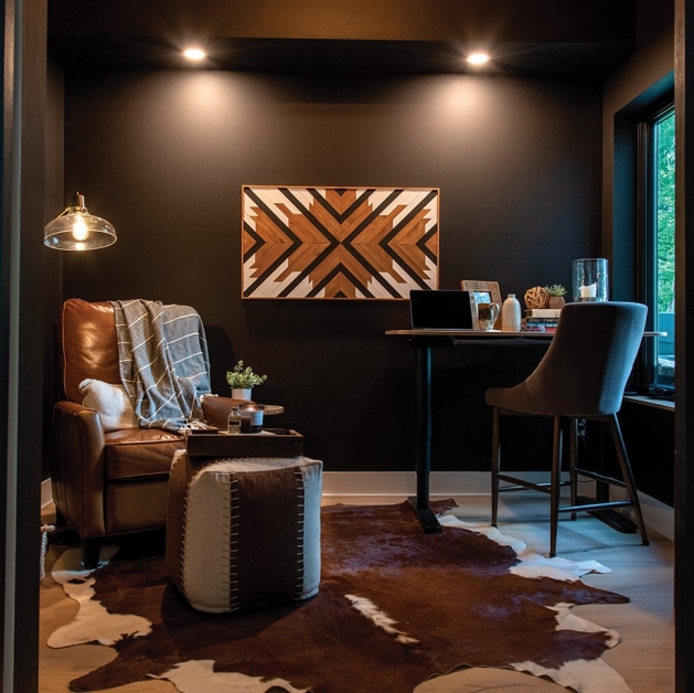 Home office by designer Christina Lynn Interiors featuring warm brown tones and leather.