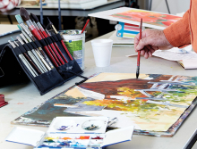 Artist Frank Zeller paints a watercolor at the White Bear Center for the Arts