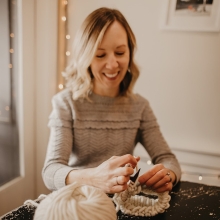 Emily Sheehan uses ethically-sourced natural fibers for her knit wool beanies and accessories.