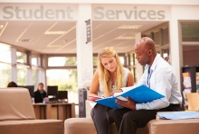 A student speaks with a support specialist at the Century College Resource and Support Center