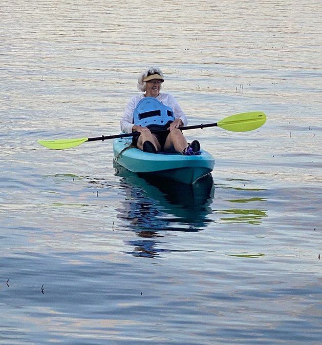 A woman kayaks on White Bear Lake
