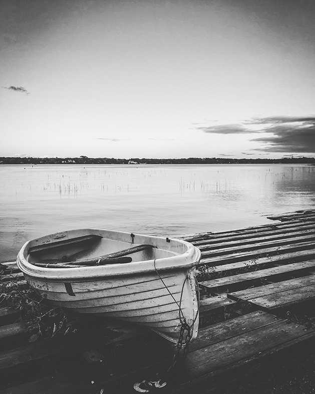 A rowboat on the shore of White Bear Lake