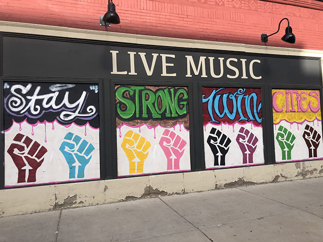 A mural that reads "Stay Strong Twin Cities."